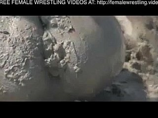 Girls wrestling in get under one's mud